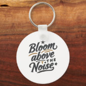 Bloei Boven de Ruis | Inspirerende Retro Sleutelhanger (Voorkant)