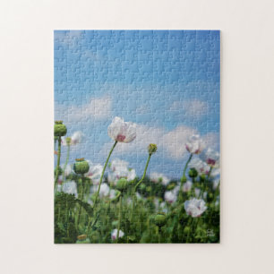 Bloeiend Papaver somneferum maanzaad bloemen. Legpuzzel