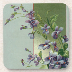 bloeiende paarse bloemen in een paasei onderzetter