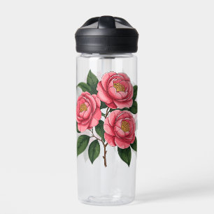 Bloeiende roze camellia bloemen met groene bladere waterfles