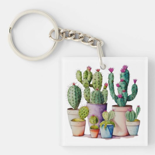 Bloeiende roze woestijn cactus vetplanten in potte sleutelhanger (voorkant)