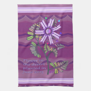 Bloem in de keukenhanddoek voor de woestijn