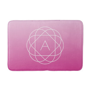 Bloemachtig geometrisch monogram roze gearceerde badmat