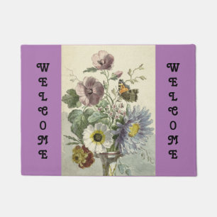 Bloemen en drijfmat van de deur deurmat