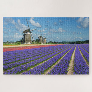 Bloemen en windmolens in een veerlandschap legpuzzel