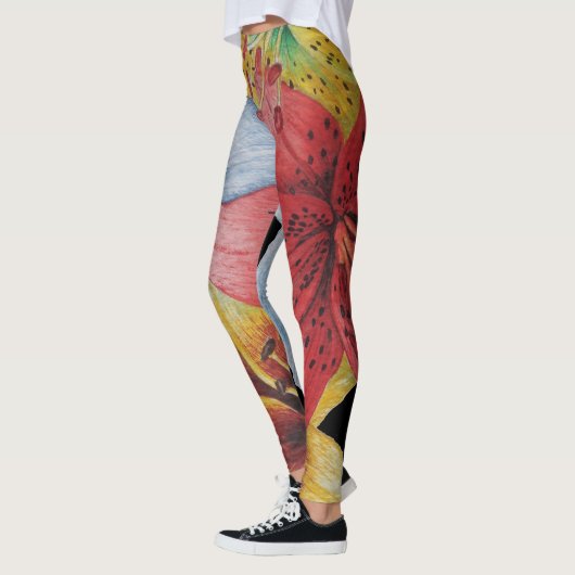Bloemen geel rood blauw vet bloemmotief leggings (Links)