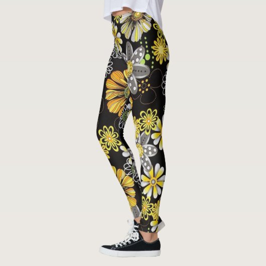 Bloemen gloeien in donkere leggings (Links)
