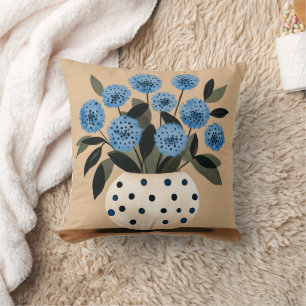 Bloemen in vaas met polkadots kussen
