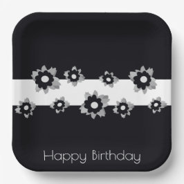 Bloemen met zwart en wit papieren bordje