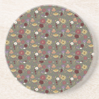 Bloemen van de herfst omarmen groene achtergrond zandsteen onderzetter