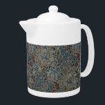 bloemen William Morris Golden Lily Theepot<br><div class="desc">Dit ontwerp is voorzien van een prachtige afdruk van 'Golden Lily', een wandpapieren ontwerp gemaakt door John Henry Dearle (1859 - 1932) en geproduceerd door Morris & Company, een producent en detailhandelaar van de stoffelijke en decoratieve kunst, opgericht door de kunstenaar en ontwerper William Morris (1834-1896). Dearle was een Britse...</div>