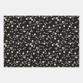 Bloemen zwaaien bladeren op zwart inpakpapier vel (Voorkant)