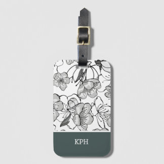 Bloemen zwart, wit en groen met monogram bagagelabel