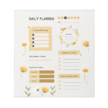 Bloemendagplanner met zonnebloemen en madeliefjes