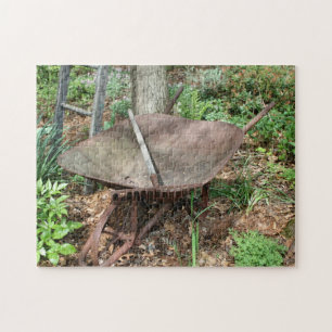 Bloementuin roestig  kruiwagen oude hark legpuzzel