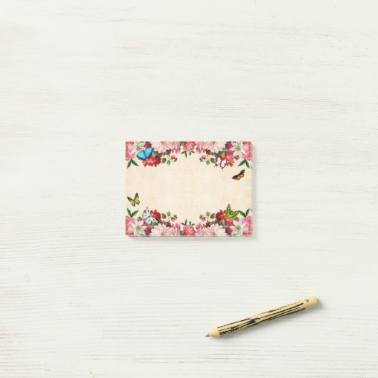 Bloemframe met vlinders post-it® notes (Op bureau)