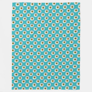 Bloemige print van madeliefjes op turquoise fleece deken