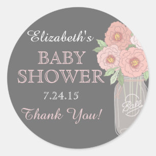 Bloemige sticker voor babyfeest in grijze roze Mas