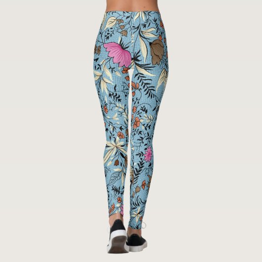 bloemmotief, blauwe achtergrond. leggings (Achterkant)