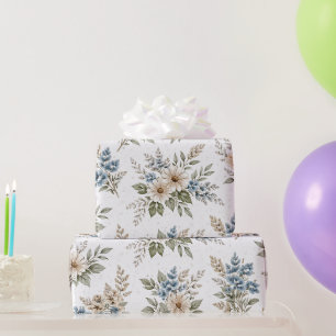 Bloemmotief in blauwe ivoor tinten voor weide insp cadeaupapier