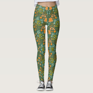 Bloemmotief op een donkergroene achtergrond leggings