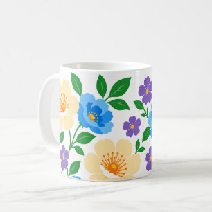 Bloemontwerp met blauwe, crèmekleurige en paarse b koffiemok