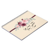 Bloemontwerp met lint in roze en zwart notitieboek (Linkerzijde)