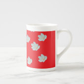 Bloesems op rood porselein kop (Rechts)