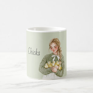 Blond meisje dat gele babykuikens vasthoudt koffiemok