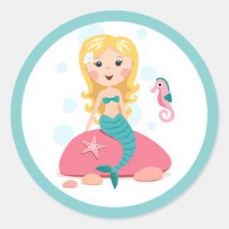 Blond meisje met cartoon van zeepaardvis ronde sticker