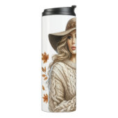 BLONDE VROUW MET VALLENDE BLADEREN THERMOSBEKER (Gedraaid links)
