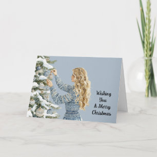 Blondine vrouw versiert kerstboom kaart