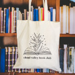 Blooming Bloemenboek Gepersonaliseerde Boekenclub Tote Bag<br><div class="desc">Dit prachtige aanpasbare ontwerp voor boekenliefhebbers, boekenwormen, auteurs, schrijvers, boekenclubvrienden of enthousiaste lezers bevat een lijngetekende illustratie van een open hardcover boek met bloemen, bladeren en sterren die bloeien uit de rug. Personaliseer met een regel aangepaste tekst eronder; perfect voor de naam van uw boekenclub, boekwinkel of evenementennaam. Gift een...</div>