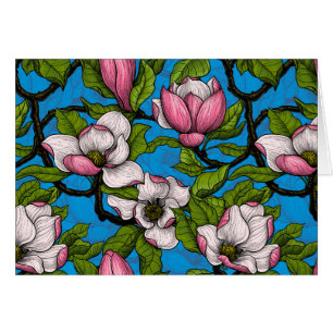 Blooming magnolia op blauw