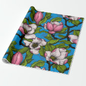 Blooming magnolia op blauw cadeaupapier (Uitgerold)