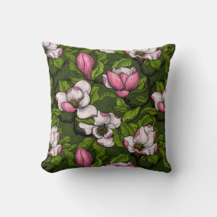 Blooming magnolia op donkergroen kussen