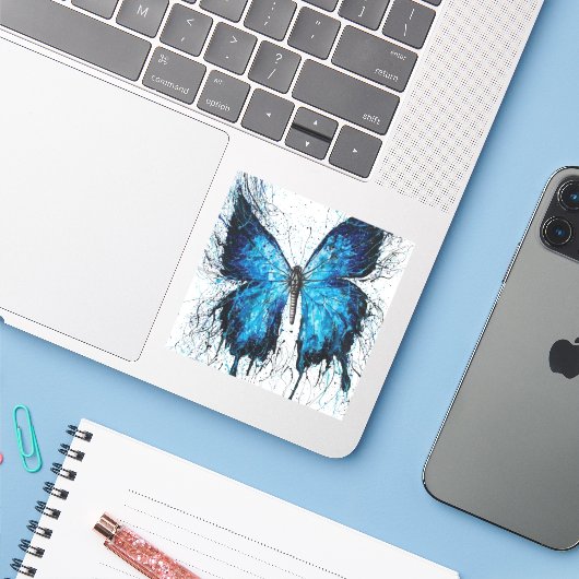 Blue and Black Butterfly Sticker (Laptop met iPhone)