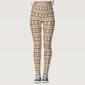 Blue and black tribal patterns on khaki coloured leggings (Voorkant)
