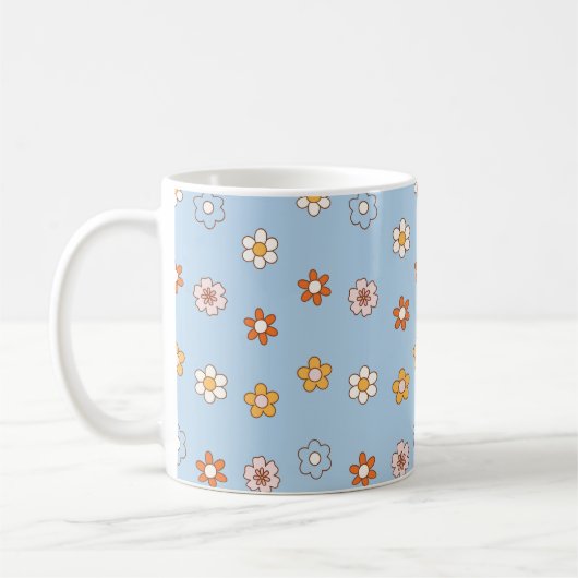 Blue background with mixed colour flowers koffiemok (Links)