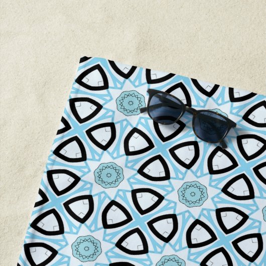 Blue, black and white geometric patterned  strandlaken (In situ)