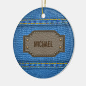 Blue denim jeans with leather name label keramisch ornament (Links)