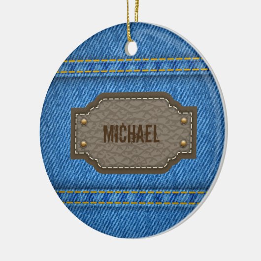 Blue denim jeans with leather name label keramisch ornament (Links)