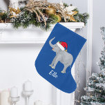 Blue Elephant Funny Custom Kinder Kerstmis Grote Kerstsok<br><div class="desc">Deze prachtige kerstolifant met een hoge kofferbak is voorzien van een mooie glimlachende olifant met een rode kersthoed. Deze  gepersonaliseerde kerstvoorraad is versierd met een mooie blauwe achtergrond. Pas je eigen tekst aan.</div>