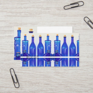 Blue Glass Corked Lined Up Botles Visitekaartje