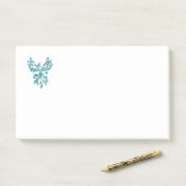 Blue Phoenix stijgt op wit Post-it® Notes (Op bureau)
