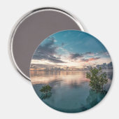 blue sky with red and dark clouds reflected on sea magneet (Voorkant / Achterkant)