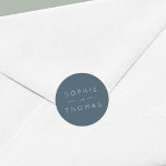 Blue Slate Wedding Ronde Sticker<br><div class="desc">Deze bruiloft sticker heeft de namen van het bruidspaar in het wit tegen een blauw leisteen kleur achterkant. Bekijk hier de overeenkomende trouwitems https://www.zazzle.com/collections/sage_layered_geometric_blue_slate_wedding-119021046856867346?rf=238364477188679314&tc=rc Personaliseer het door de tekst van de plaatsaanduiding te vervangen. Voor meer opties zoals om het lettertype te wijzigen, het is grootte en ruimte tussen letters klik...</div>