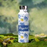 Blue Toile Palm Trees Lemons Monogram Name Waterfles<br><div class="desc">Blue Toile Palm Trees Lemons Monogram Name Water Bottle. Bring a splash of tropical coastal charm to your daily routine with this lovely water bottle featuring a light blue striped background adorned with sketched blue palm trees and vibrant yellow lemons. Customizable white script lettering, for your name making it a...</div>