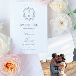 Blue Wildflowers Monogram Crest Save The Date Kaar<br><div class="desc">Blue Wildflowers Monogram Crest Save The Date Kaart Elegante en delicate bruiloft opslaan van de datum kaart met een monogram kam versierd met delicate kleine blauwe wilde bloemen en groen op een witte achtergrond. De foto van het koppel verschijnt op de achterkant.</div>