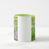 Bluebird male on fence post in flower garden mok (Midden)